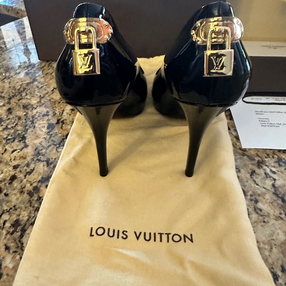 Louis Vuitton Shoes - Authentic Louis Vuitton Oh Really Platform Peep-Toe Pumps.
Size 38.5  NEW